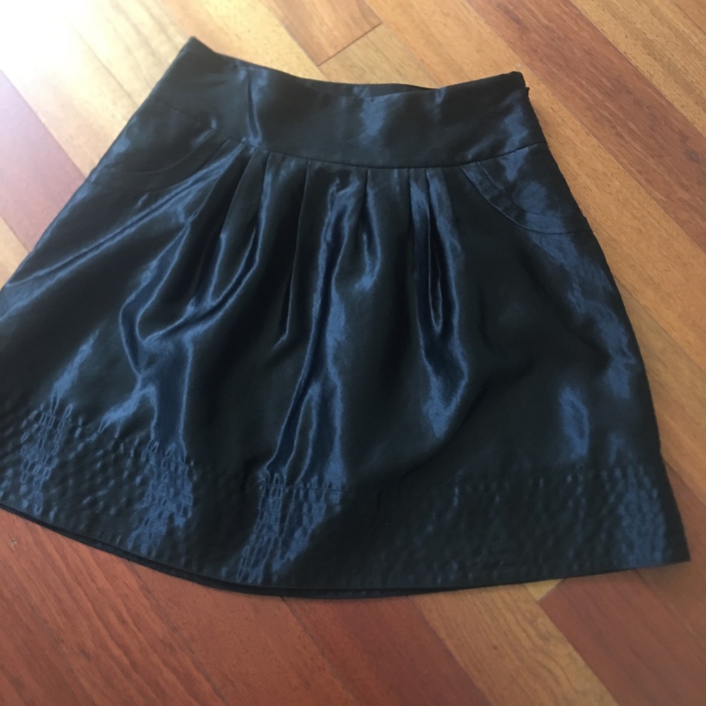 Satin a-line skirt with pockets & detail at bottom